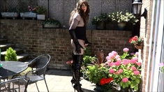 Sexy Transvestite in Thigh Boots wanking in the garden