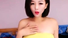 Super hot asian with big boobs stripping and masturbating